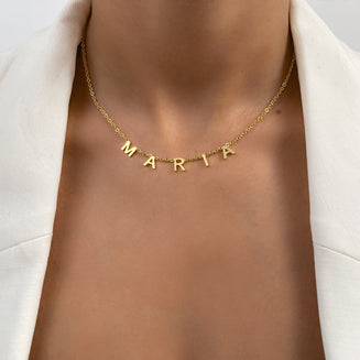 model wearing Classic suspended custom name necklace in 18k gold plated from prya