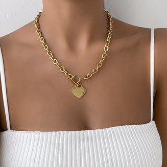 model wearing hayley heart t bar necklace in 18k gold plated from prya