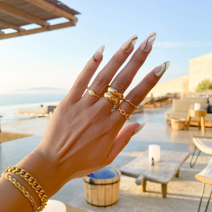 model wearing gold double band ring