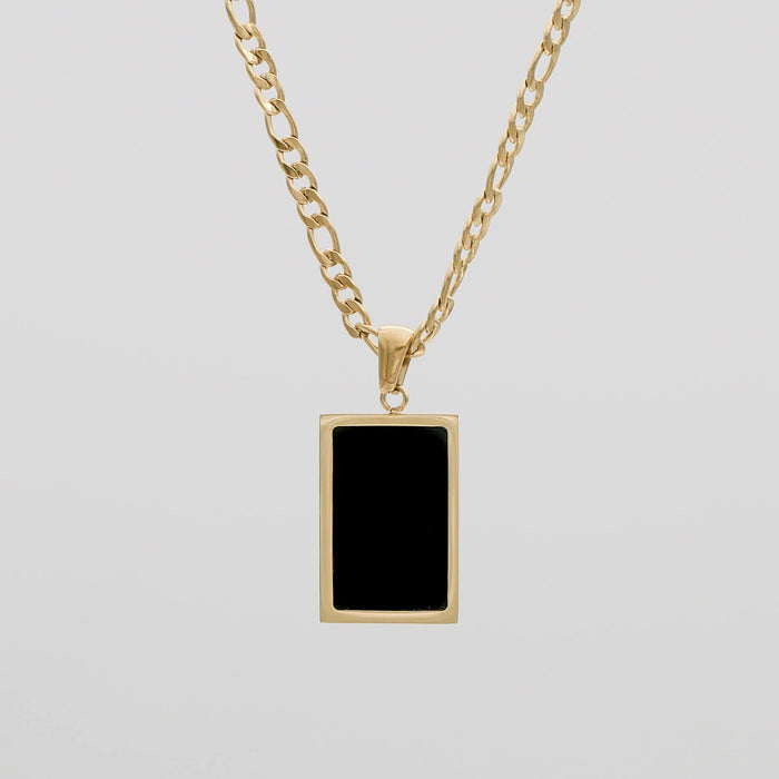 Gold chain with black rectangular pendant.