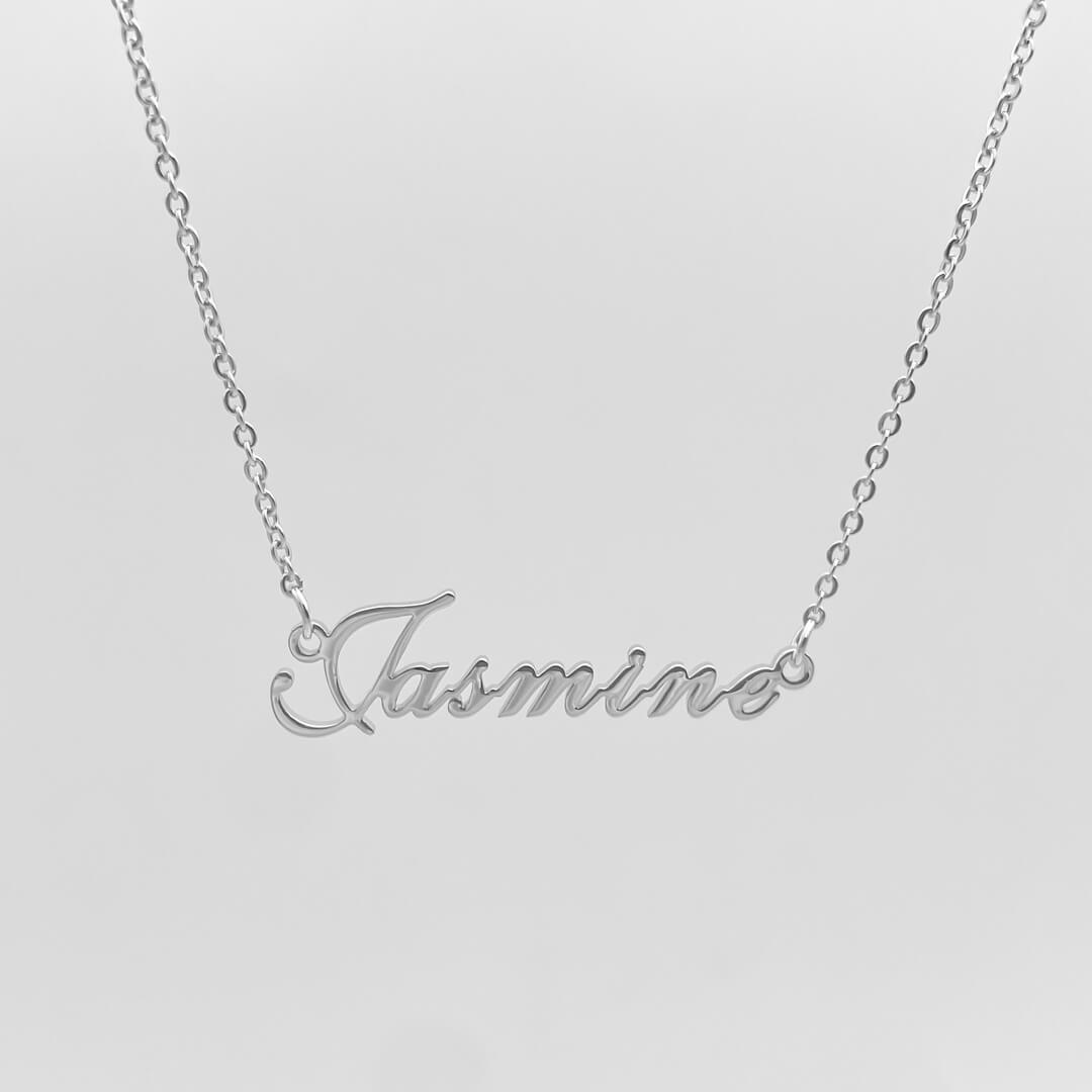 Silver personalised name necklace in a display case