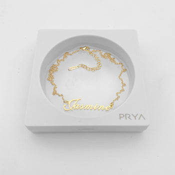 Siena Personalised name necklace in gold in display case by PRYA Jewellery UK