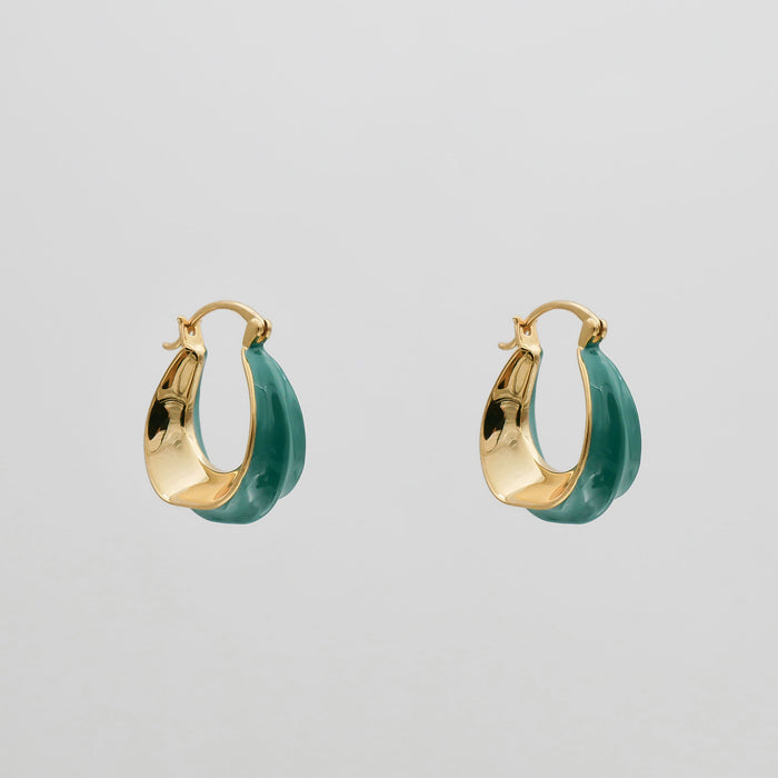 Gold and green hoop earrings.