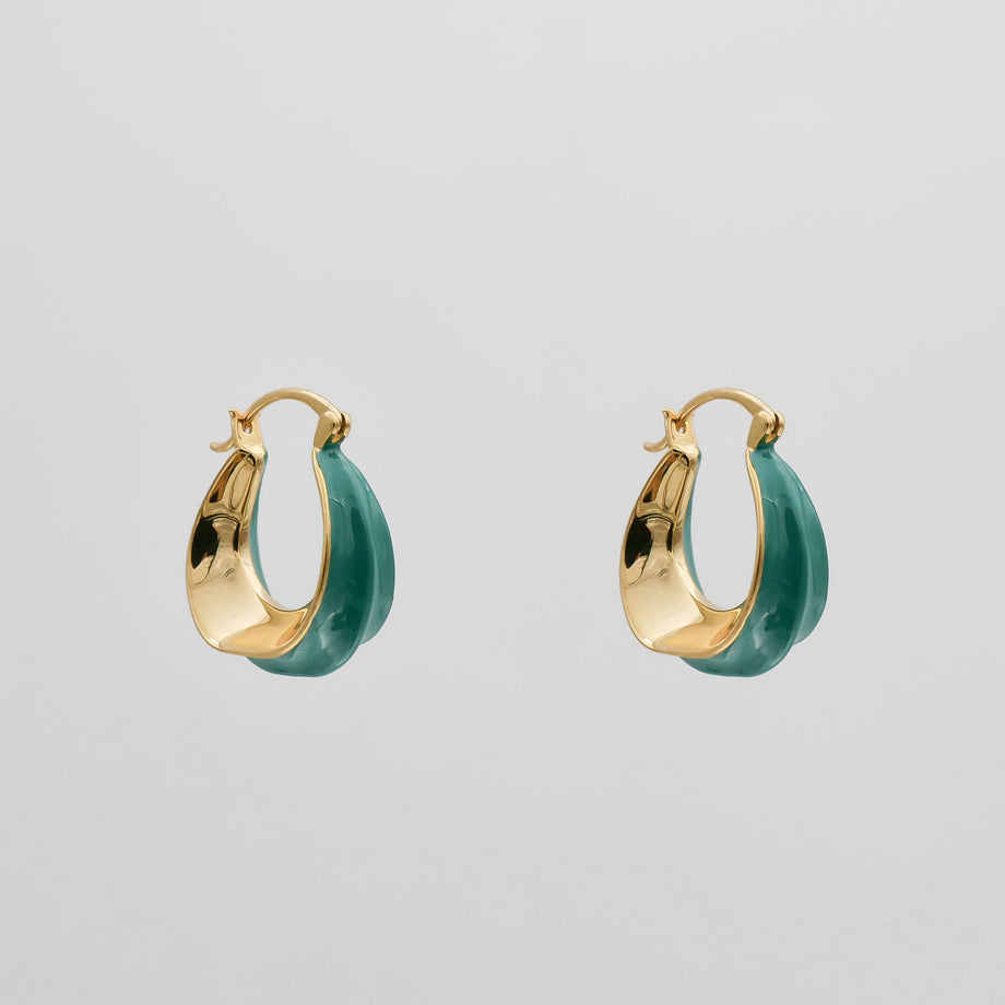 Gold and green hoop earrings.
