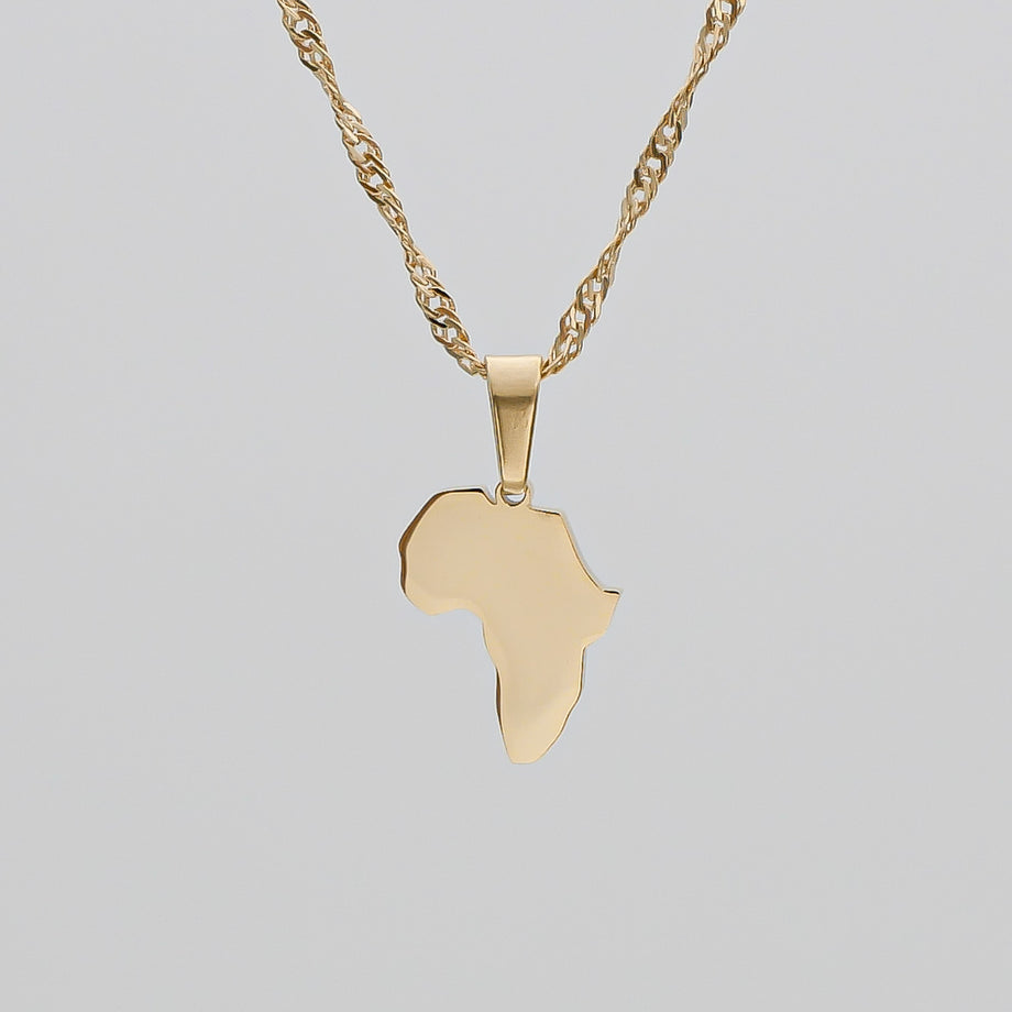 Gold necklace with Africa-shaped pendant.