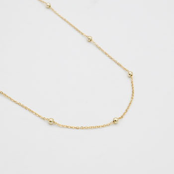 Gold sphere chain