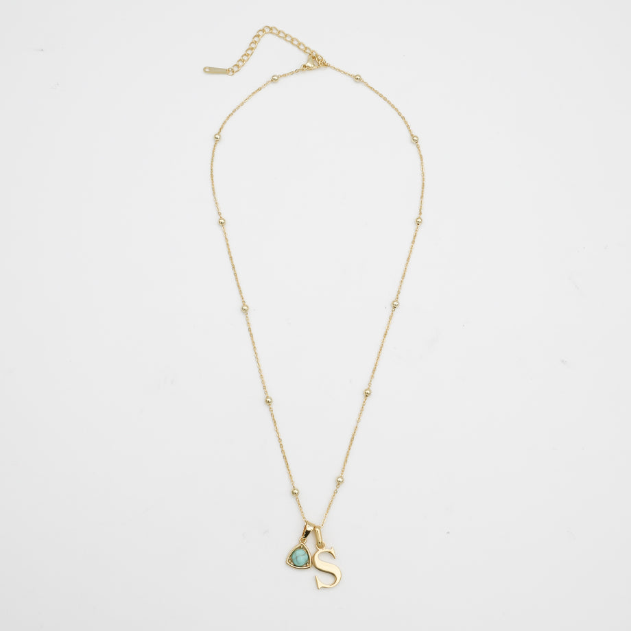 Gold initial birthstone necklace in sphere chain