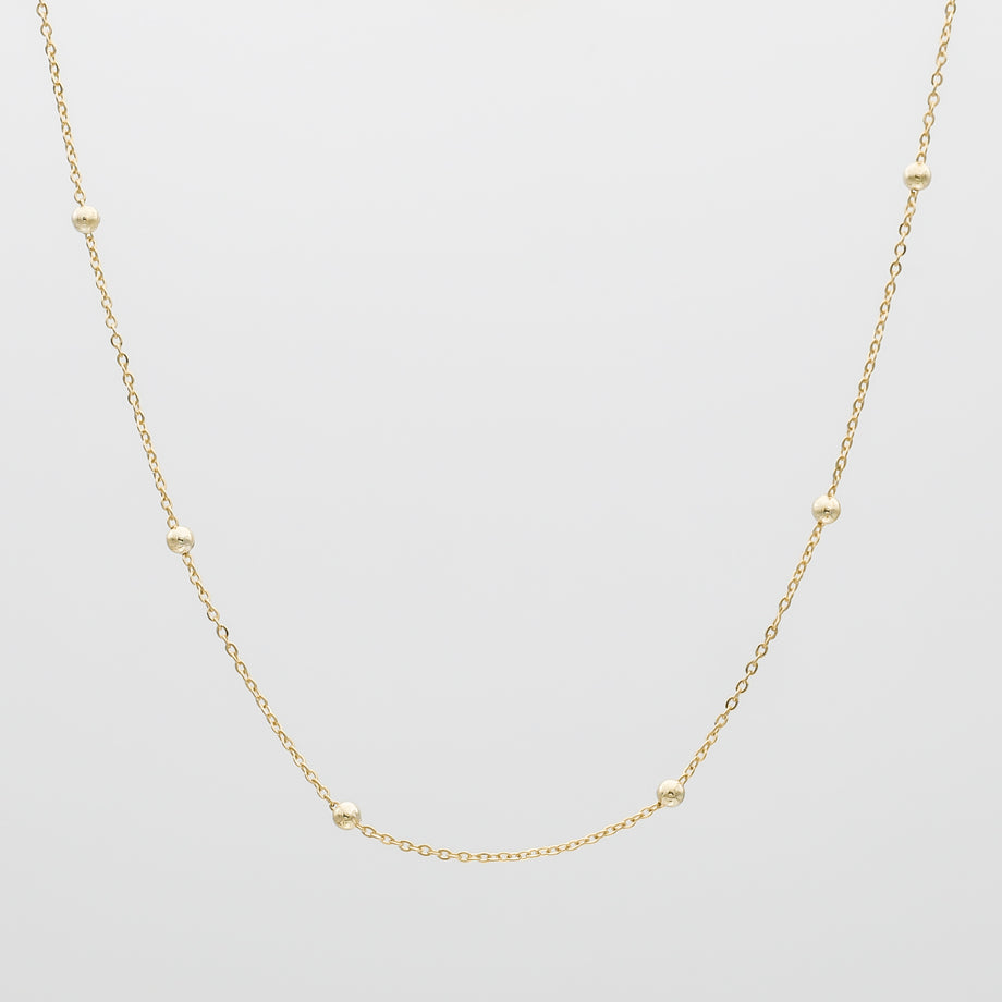 Gold sphere chain