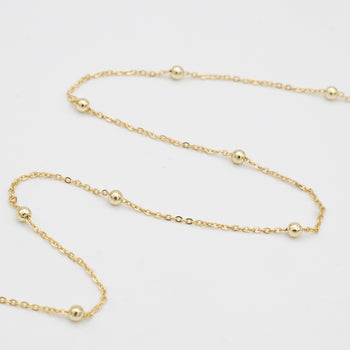 Gold sphere chain