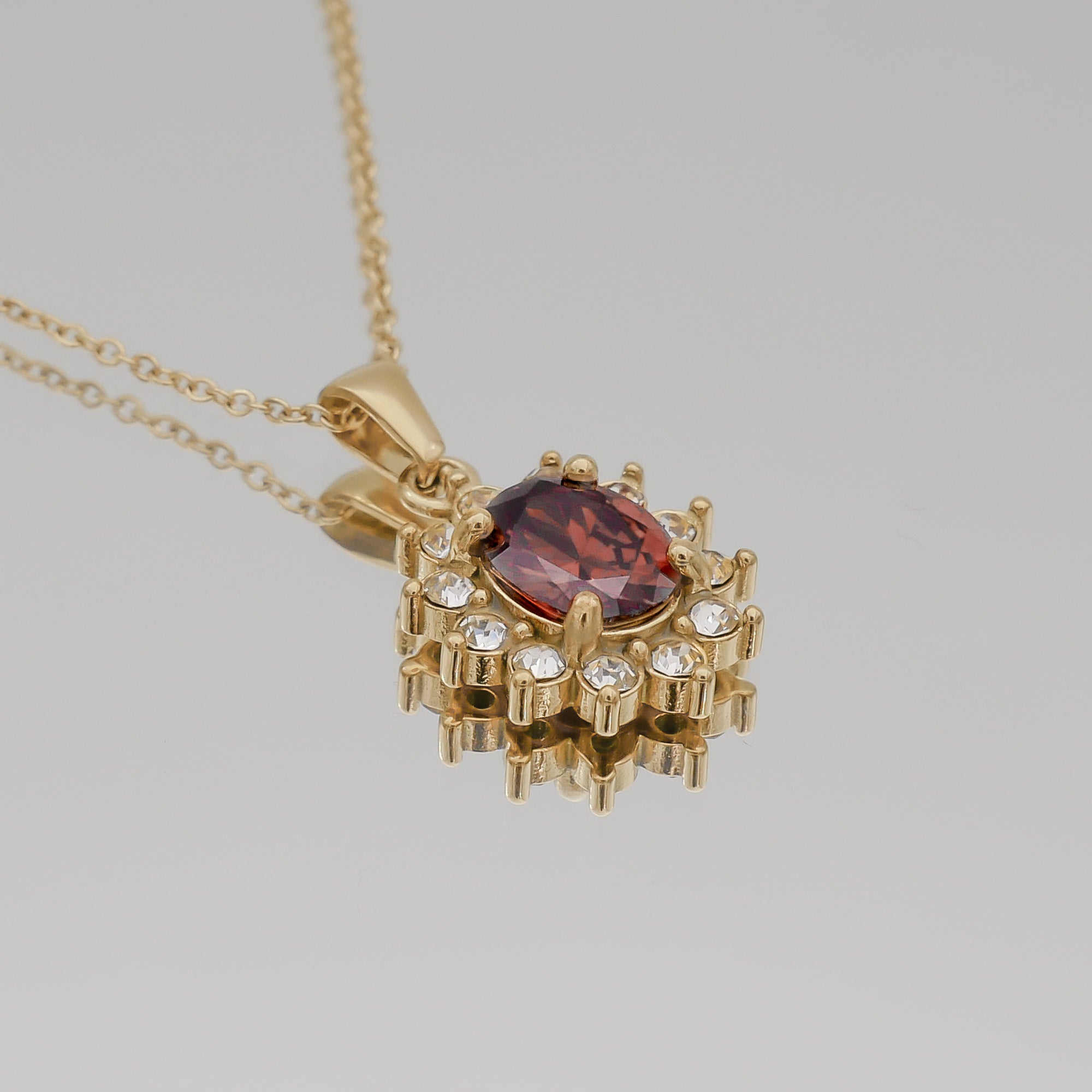 Gold Phoebe Ruby Gemstone Pendant Necklace with encrusted cubic Zirconia stones by PRYA