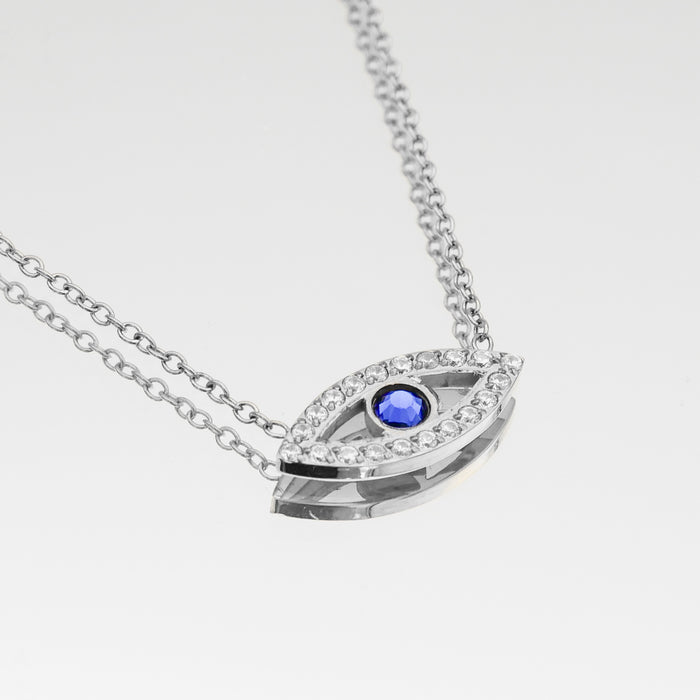 silver evil eye necklace with  paved cz stones and blue stone centre