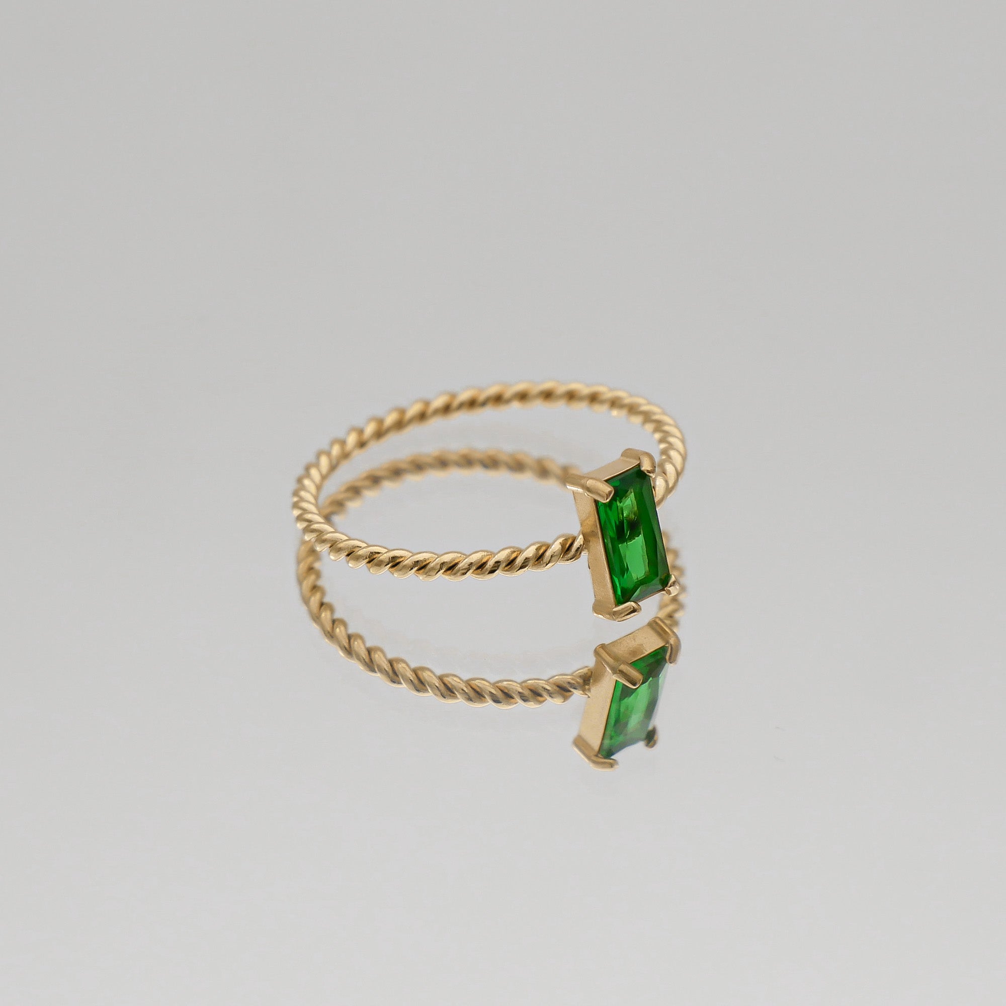 Selin twisted ring in emerald cz