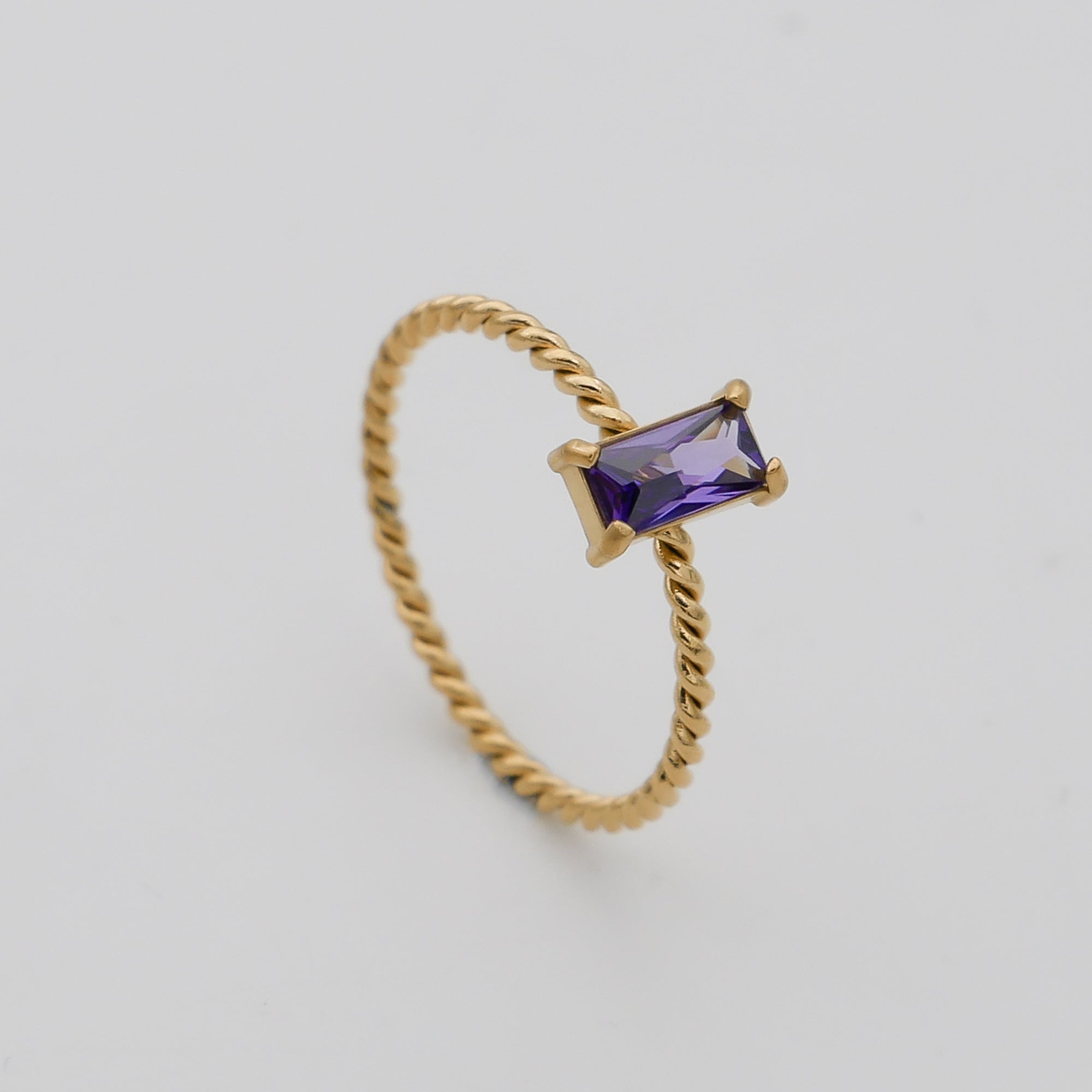 Selin twisted ring in purple cz