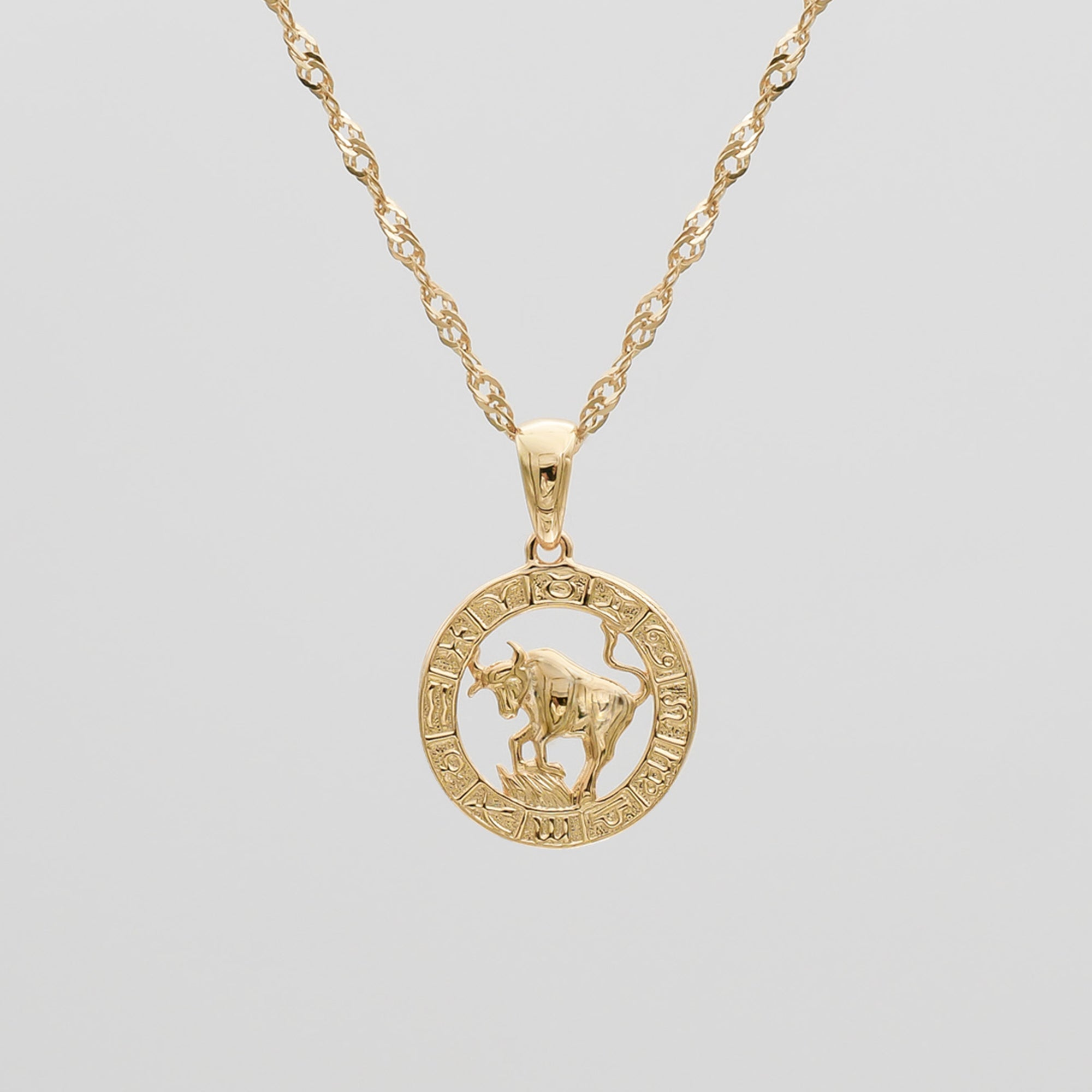 Gold Taurus Zodiac Pendant Necklace by PRYA
