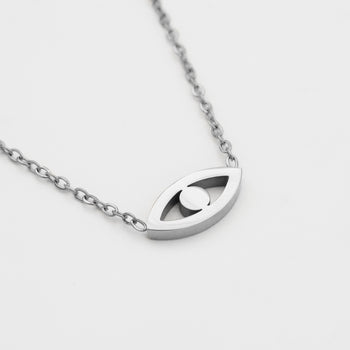 close up of Evil eye necklace in silver