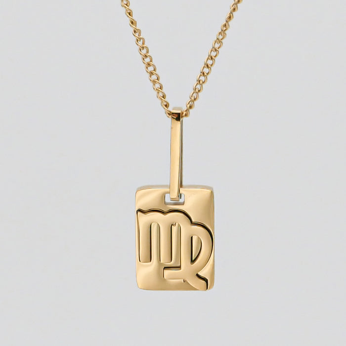 Gold Virgo zodiac necklace on chain.