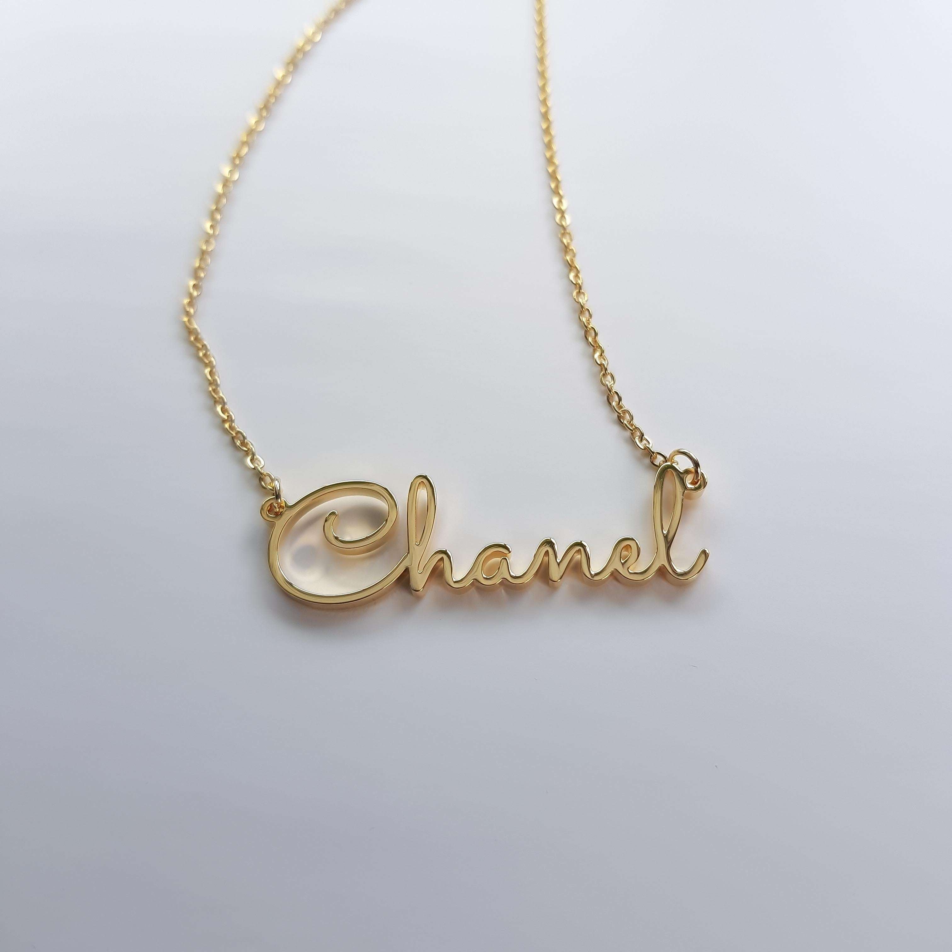 Gold Chanel London Name Necklace